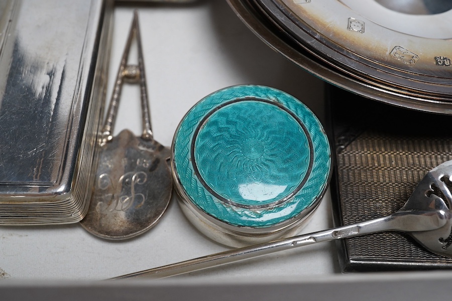 Small silver to include - two cigarette boxes, a William IV snuff box, an 18th century moat spoon, an enamelled pill box, a golfing pitch mark repairer?, two ashtrays and three Armada type dishes, 640g gross. Condition -